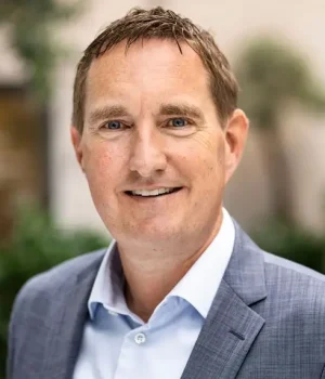 Anders Pii, partner at IZARA, smiling at the camera